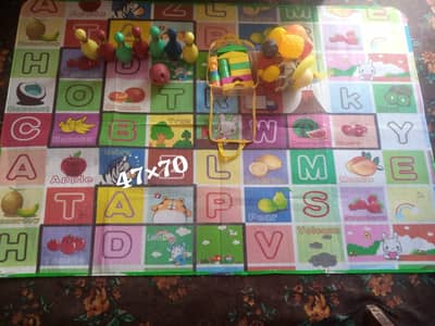 Mat with toys