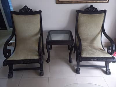 Wooden chairs with table