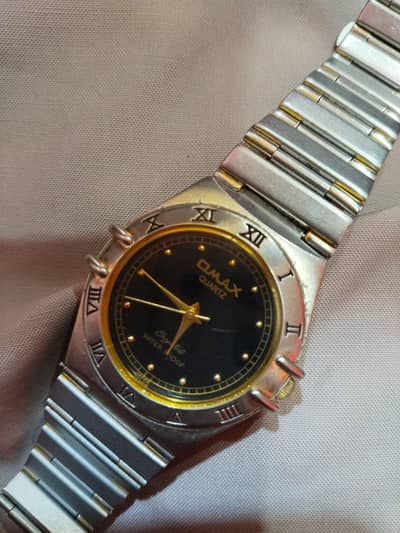 OMAX Quartz Original Watch – Stylish Metal Strap | Good Condition