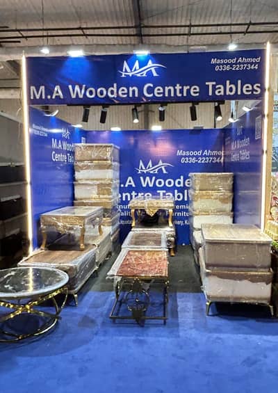 M. A Wooden Centre Tables