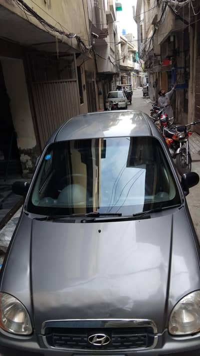 Hyundai santro 2006 {"90% genuine car i will granted"}