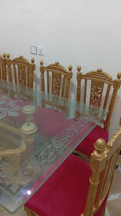 original chenioti dinning table with chairs (like new)  wooden