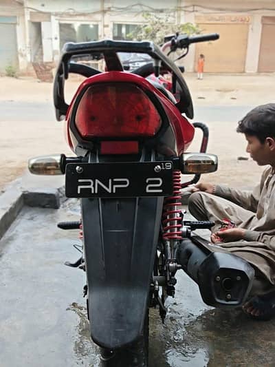 unique Number hai bike ka with silencer and handle