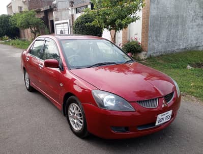 Mitsubishi Lancer SR . . 100% new car