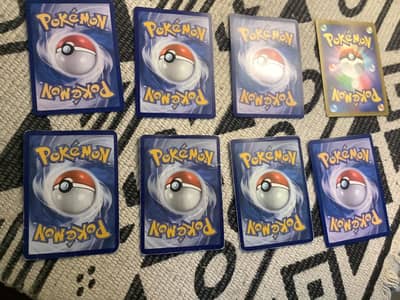 Pokémon cards with 3  sleeves  urgent sale