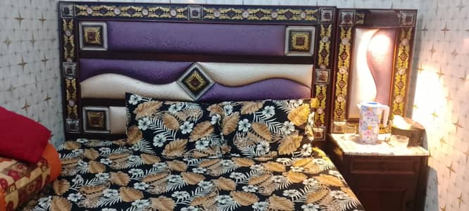 bed with two side tables