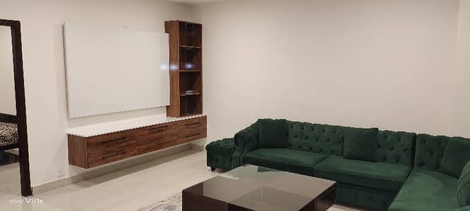 2 Bedroom Furnished Apartment available for rent on prime location facing farm house & ring road