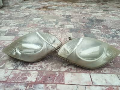 Toyota Corolla x / Fielder japan koito 100-77307 OEM  headlights.