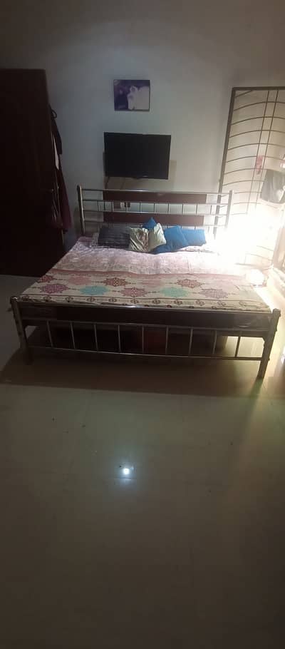 Iron bed with mattress