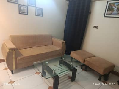 Sofacombad puffy chairs glass table