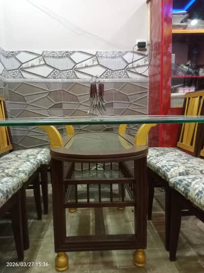 DINNING TABLE WITH SIX CHAIR ( BY FAMOUS BANDOOK WALA)