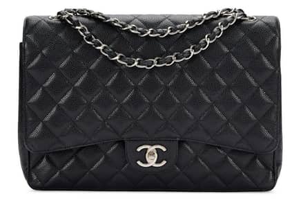 Chanel black quilted caviar handbag