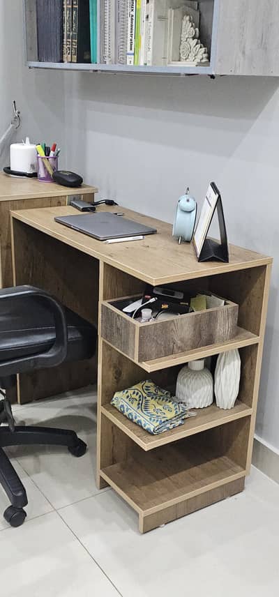 Study table with a book shelf and a chair