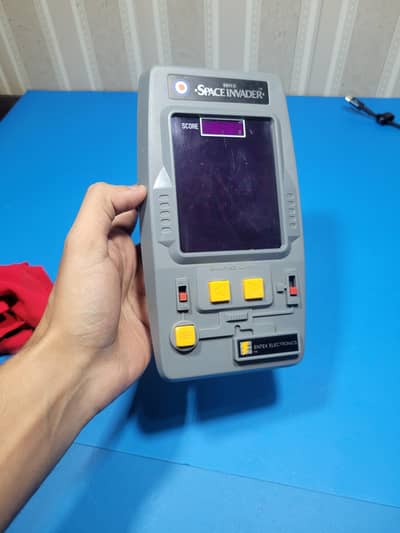 Entex Space Invader 80s handheld gaming console