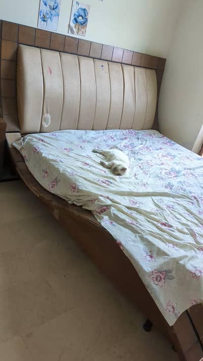 Wooden bed with side tables for sale