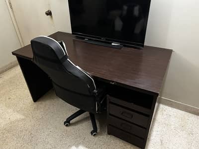 Spacious executive/boss-style office table available for sale.