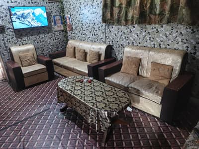 6 seater sofa and table 1 large and 2 small