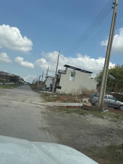 I-14/2. Plot number 1564-B size 30*60 Main Service Road 150 feet Road level with Extra land D-170 lack