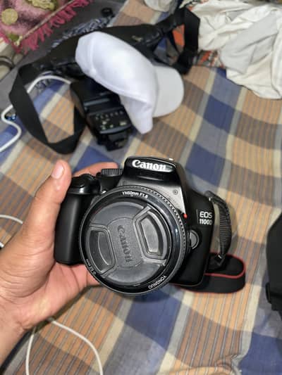 Canon 1100d DSRL With 50mm lense best for picture and vedios