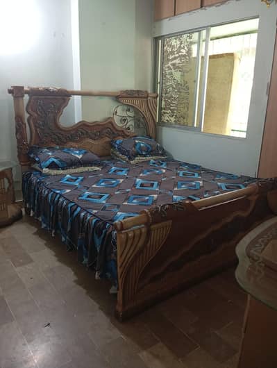 King size bed one side table dressing table and wardrobe.