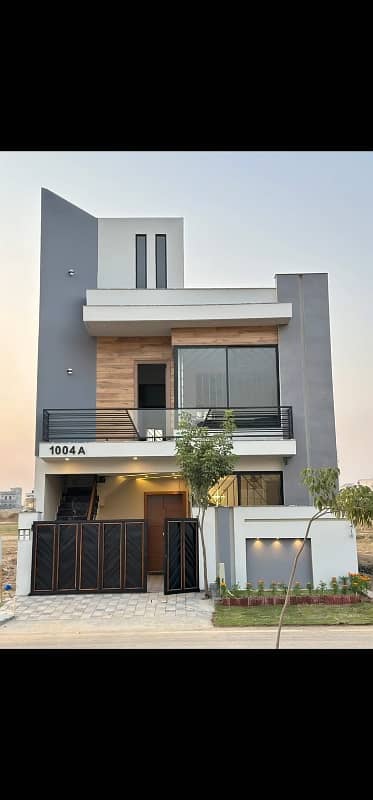 5 Marla Double Unit Designer House Available. For Sale in Faisal Town F-18 Islamabad.