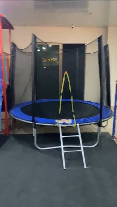 Complete play area for kids (slides,jumping,swings)
