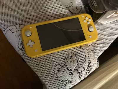 Nintendo Switch Lite With Game (Used)