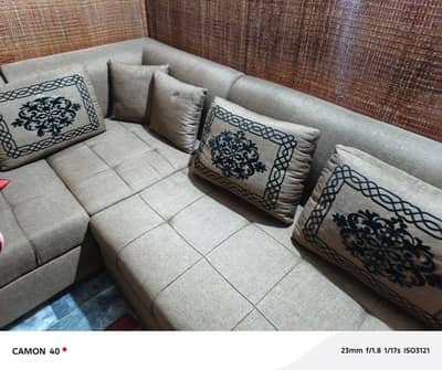 L shape 7 seater with attached table and center table for sale