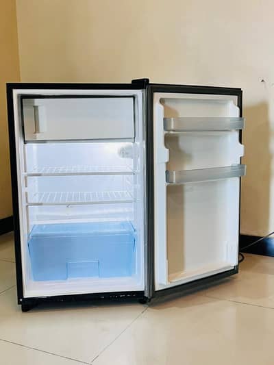 small fridge with freezer portion
