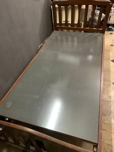 i am selling 2 single beds with mattress