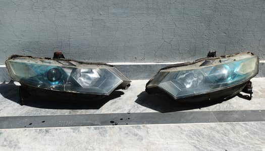 Honda Insight 2010 Headlights & Front Bumper