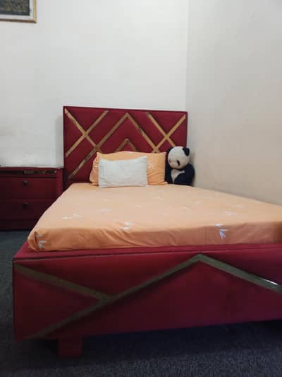 “Stylish Red Wooden Bed Set with Side Table – Good Condition”