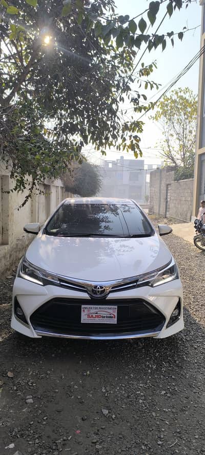 Toyota Grande 1.8X White With Black
