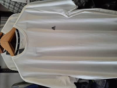 "Men & Women T-Shirts and Trousers - Best Prices - Town, Islamabad"