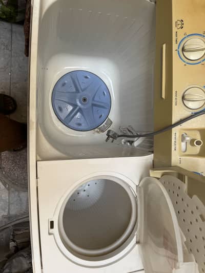 A used washing machine and dryer is available here