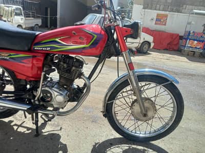 united 125 Karachi num 2016 model behtreen condition