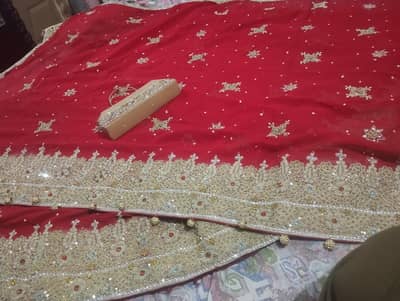 bridal lehanga red golden colour