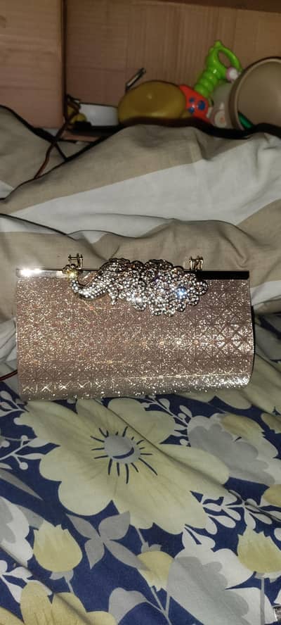 beautiful golden peacock clutch available for sale