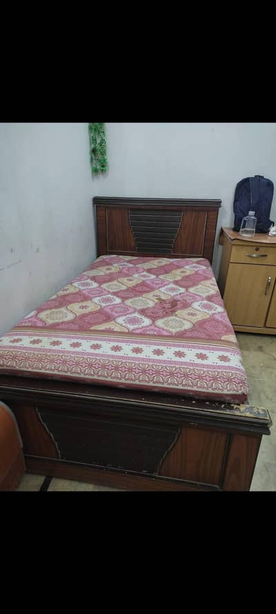 wooden single bed