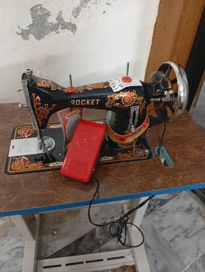 Sewing machine with stand for sale