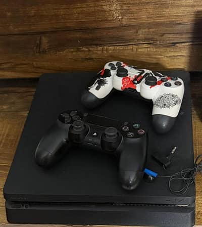 Used PS4 Bundle – Good Condition | 2 Controllers, Headset + 5 Games