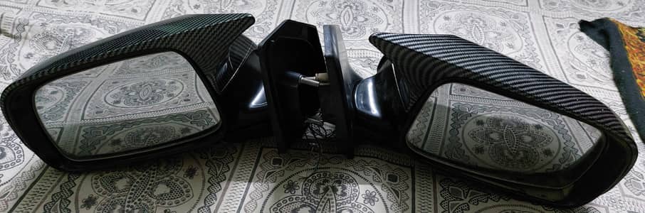 Japanese Corolla X geniune retractable side mirrors.