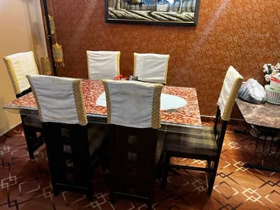 Dark brown with 6 chairs dinning table imported glass