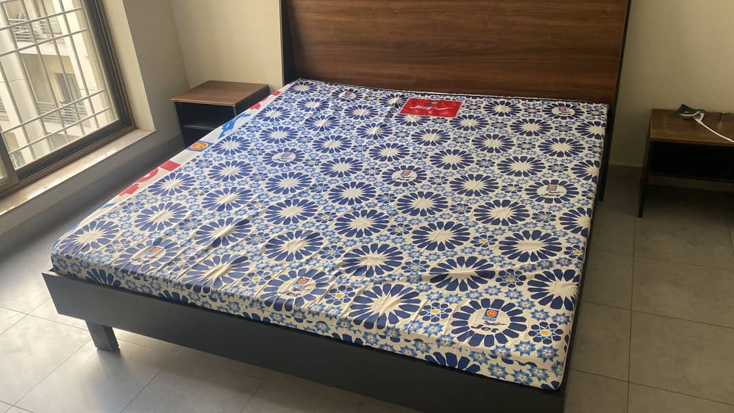 Bed with side table 0