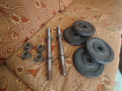 Adjustable Dumbells he . 2rods and 4 plates