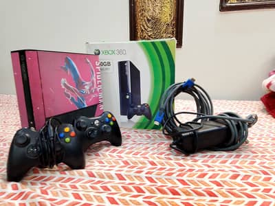 Xbox 360 ultra slim  wit 2 controllers  1 HDMI cable and 1 adapter