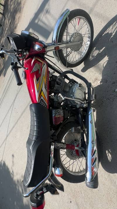 Honda 125 125 model red for sale