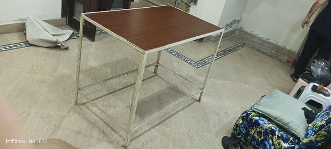 Metal angled table