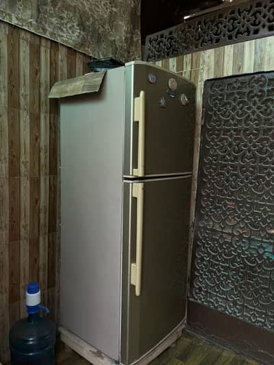 Haier 2 door gold colour fridge 66 inch lenght and 25 inch breath