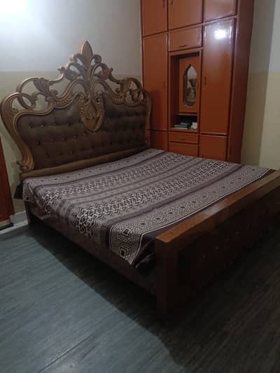 double bed(king size) + metress+ dressing+ 2 side tables.